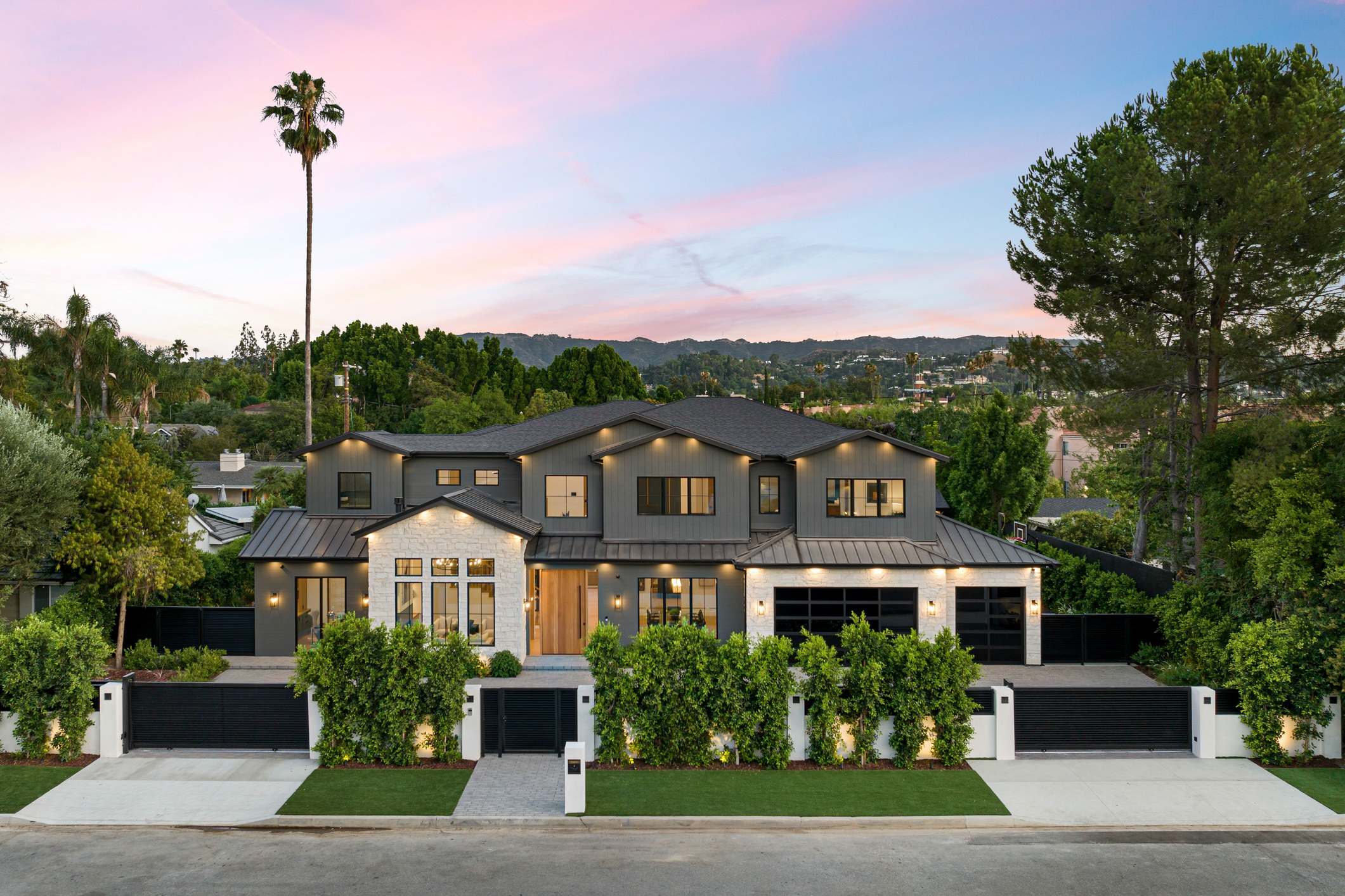 Luxury custom home with landscaped front yard