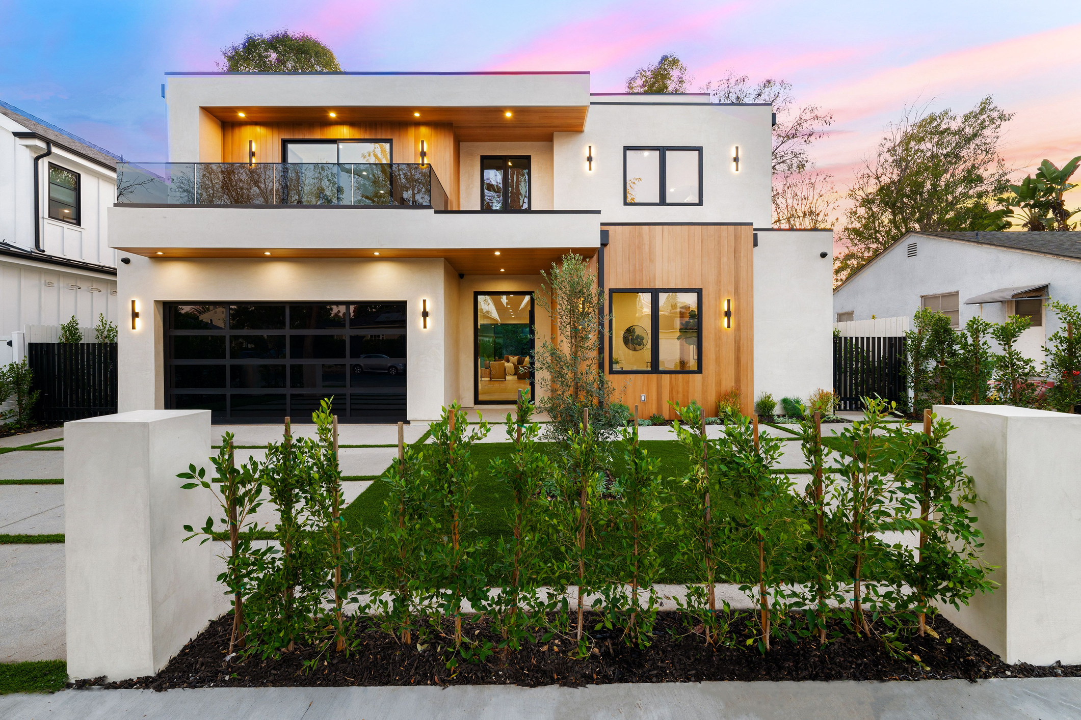 Modern two-story luxury home with landscaped front yard